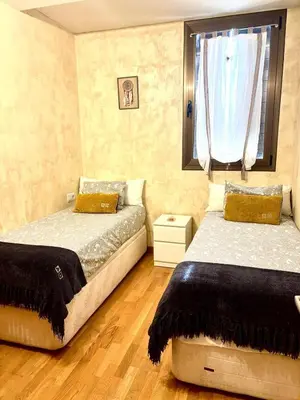 Cama o camas de una habitación en APARTAMENTO L AÜT