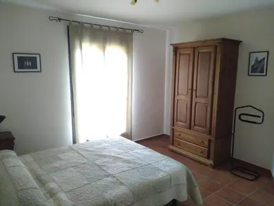 Cama o camas de una habitación en Apartamentos Aires de Guara