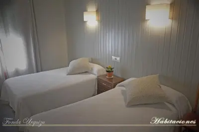 Cama o camas de una habitación en Fonda Urquizu