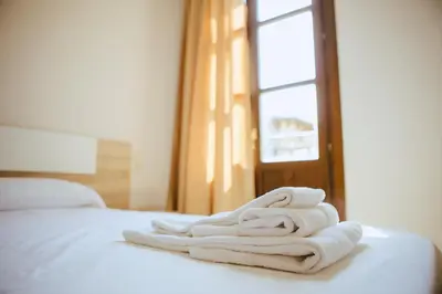 Cama o camas de una habitación en Apartamentos Ducay