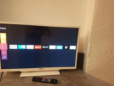 Una televisión o centro de entretenimiento en Apartamento CabezoDoce