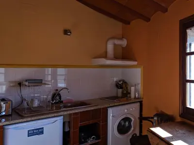 Una cocina o zona de cocina en L'Acadèmia de La Vilella Baixa