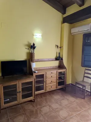 Una televisión o centro de entretenimiento en APARTAMENTOS MATARRANYA