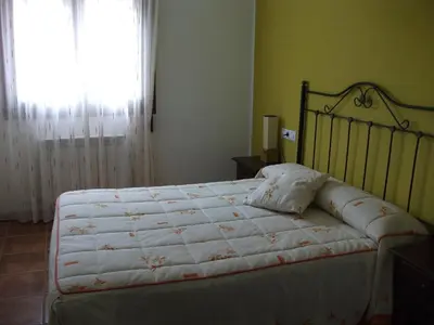 Cama o camas de una habitación en Apartamentos Arcos de Solana