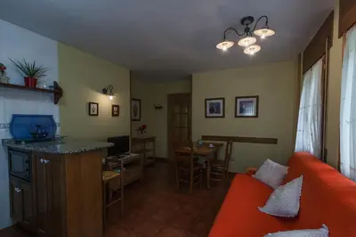 Una televisión o centro de entretenimiento en Casa Martin Ordesa