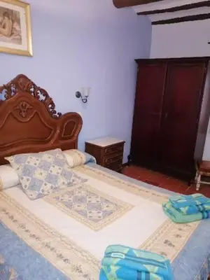 Cama o camas de una habitación en Casa Cartujet
