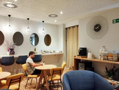 Zona de estar de Habital Suites