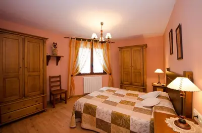 Cama o camas de una habitación en Apartamentos Casa Aneta
