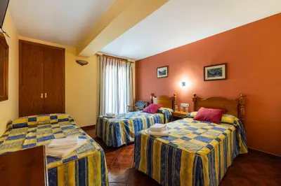 Cama o camas de una habitación en Hostal Pañart
