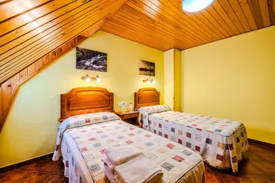 Cama o camas de una habitación en Hostal Pañart