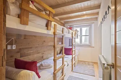 Cama o camas de una habitación en Luderna - Apartamento Val de Ruda A30 Manaud