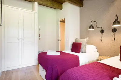 Cama o camas de una habitación en Luderna - Dúplex con jardín des Treuetes