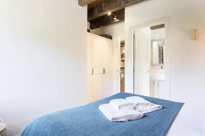 Cama o camas de una habitación en Luderna - Dúplex con jardín des Treuetes
