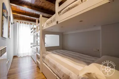 Cama o camas de una habitación en ARTIGA de Alma de Nieve