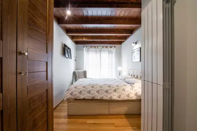 Cama o camas de una habitación en ARTIGA de Alma de Nieve