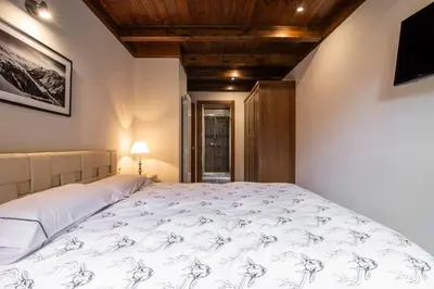 Cama o camas de una habitación en ARTIGA de Alma de Nieve