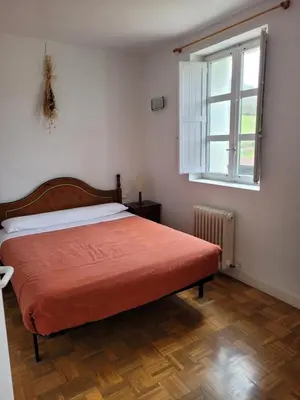 Cama o camas de una habitación en Posada Sarigarri