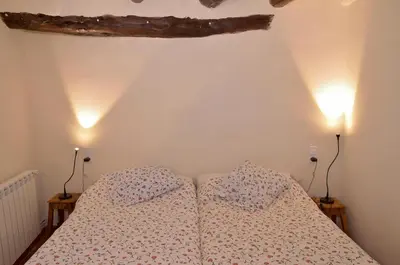 Cama o camas de una habitación en Apartamento Vivienda Sampietro