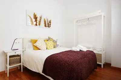 Cama o camas de una habitación en Condesa de Bureta con GARAJE INCLUIDO