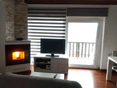 Una televisión o centro de entretenimiento en Apartamento Ismael