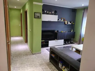 Una televisión o centro de entretenimiento en Bright apartment in Barbastro, 70m², parking included