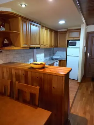 Una cocina o zona de cocina en Acogedor Apartamento 2 Habitaciones en Boí