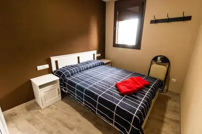 Cama o camas de una habitación en CASA CAL METGE