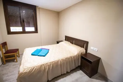 Cama o camas de una habitación en CASA CAL METGE