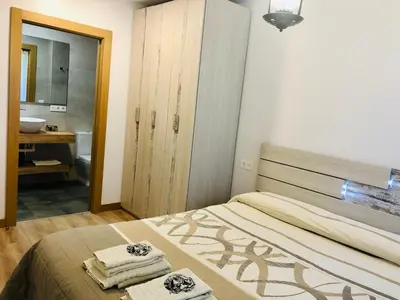 Cama o camas de una habitación en Apartamentos Zabalarena Artzaia