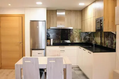 Una cocina o zona de cocina en Apartamentos Zabalarena Ola