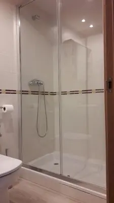 Un baño de Apartamentos Casa Trato