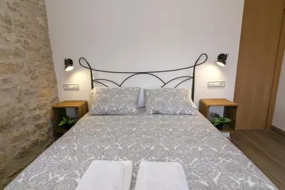 Cama o camas de una habitación en La Bodega de Puy