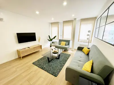 Una televisión o centro de entretenimiento en Apartamenticos Plaza Sas I
