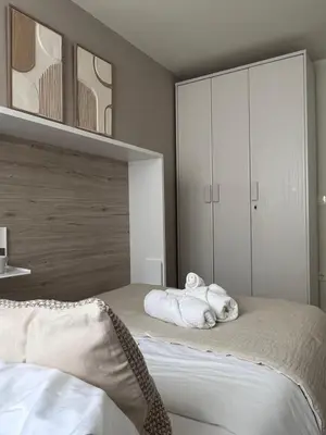 Cama o camas de una habitación en El Balcón del Ebro by Alogest- Vistas, piscina y 2 parking
