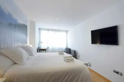 Cama o camas de una habitación en Andrews house, 60 m en el centro de Zaragoza