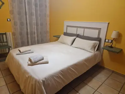 Cama o camas de una habitación en Casa Che Playa & Montaña Biescas
