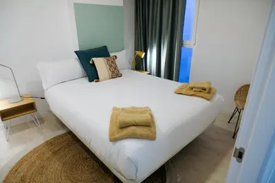 Cama o camas de una habitación en Silken Casa Platerias Siglo XV