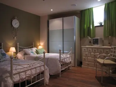 Cama o camas de una habitación en Hostal Beti-jai