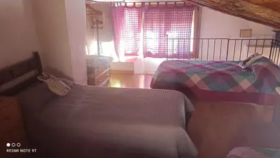 Cama o camas de una habitación en L'Antic Forn de Paüls