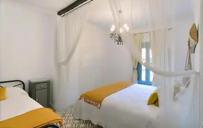 Cama o camas de una habitación en La Boutique