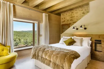 Cama o camas de una habitación en Torre del Marqués Hotel Spa & Winery - Small Luxury Hotels