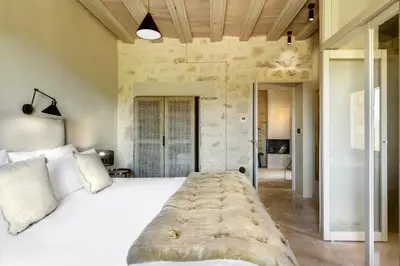Cama o camas de una habitación en Torre del Marqués Hotel Spa & Winery - Small Luxury Hotels
