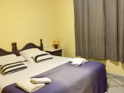 Cama o camas de una habitación en La Fusteria del Casat