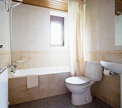 Un baño de Apartamentos Casa Buisan