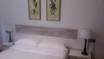 Cama o camas de una habitación en Pensión Room Pamplona