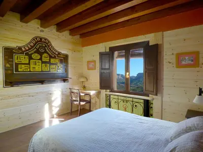 Cama o camas de una habitación en Hotel rural reina Berta