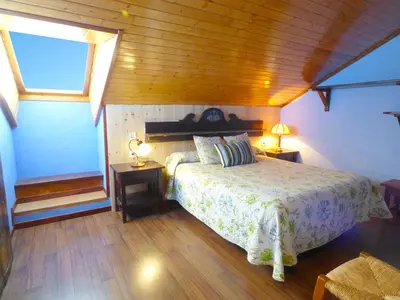 Cama o camas de una habitación en Hotel rural reina Berta