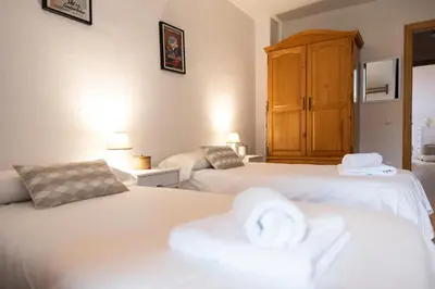 Cama o camas de una habitación en Casa Pelaire Biescas