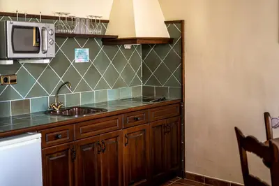 Una cocina o zona de cocina en Hotel SPA Don Iñigo de Aragón