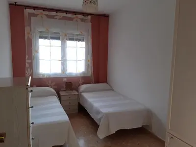 Cama o camas de una habitación en Apartamento El Portiel